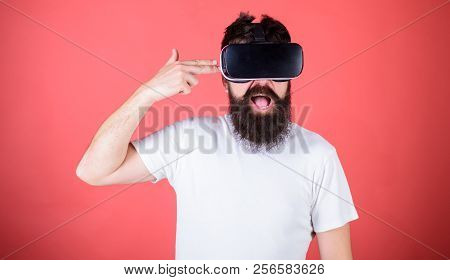 Suicide Shot Game. Man Bearded Hipster With Virtual Reality Headset On Red Background. First Person 