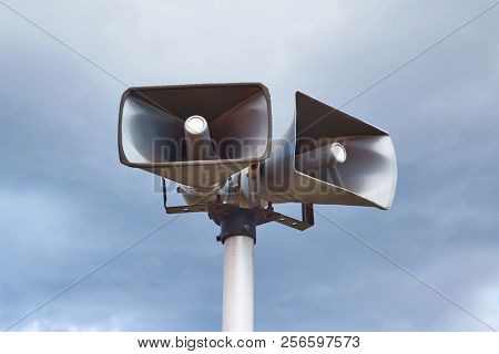 Old loudspeakers at a railway station