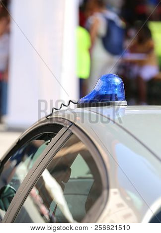 Blue Siren Of The Police Car In The City During A Plainclothes Check