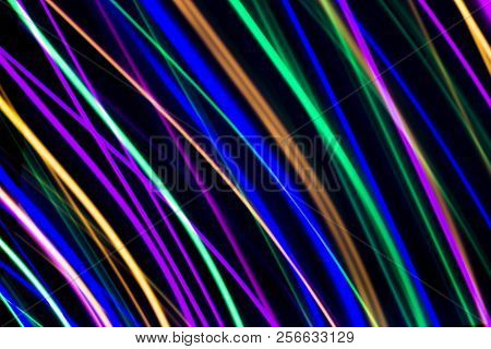 Multi Color Light Painting, Long Exposure Photography, Abstract Lines Of Color Against A Black Backg