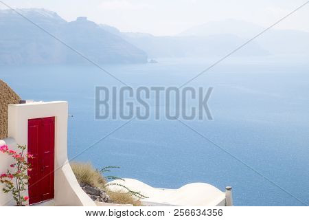 Detail Of Red Terrace Door With Ocean Background, Santorini