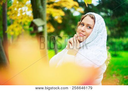 beautiful young plussize model   in the autumn park