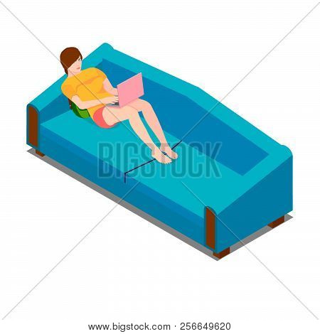 A Freelancer Girl Is Working At Home On A Laptop On The Sofa.