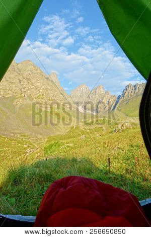 Camping With A View On Chaukhi Mountain Pass From Abudelauri Green Lake In Caucasus Mountains