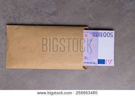 Euro In Beige Envelope, Isolated On A Grey Background