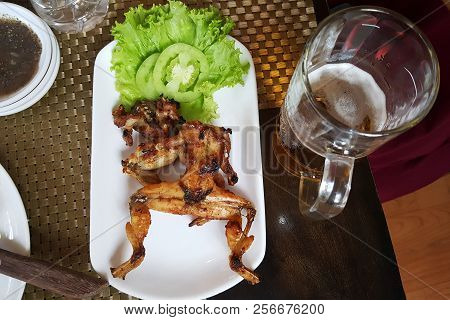 Domestic Cambodian Dish Grilled Frog. Delicious Exotic Food Served In Siem Reap Restaurant