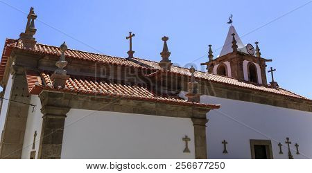 Detailed View Of The Crosses And Pinnacles On The Roof Of The Parish Church Of The Village Of Castel