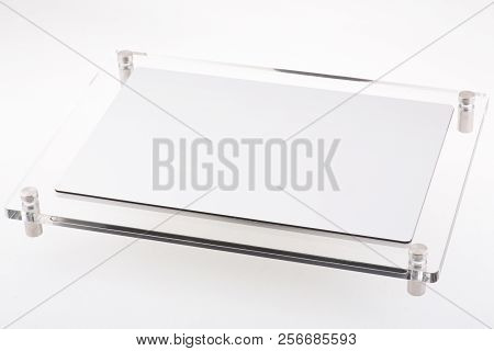 Dental Ceramic Veneers And Crowns Isolated With Mirror Background.