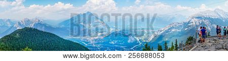 Banff, Canada - Aug 1, 2018: Visitors Enjoying A Panoramic View Of The Mountain Range In The Canadia