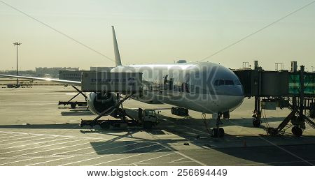 Passenger Airplane Docking At The Airport