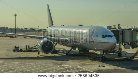 Passenger Airplane Docking At The Airport