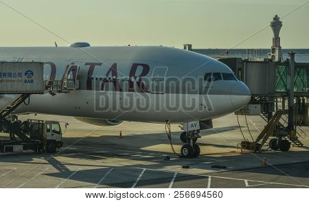 Passenger Airplane Docking At The Airport