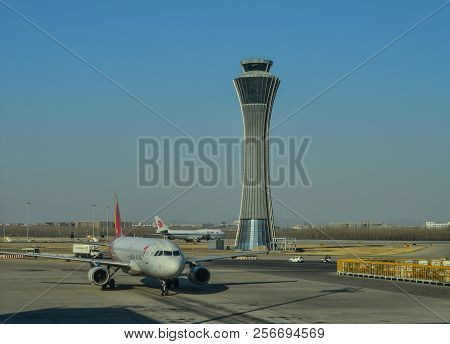Passenger Airplane Docking At The Airport