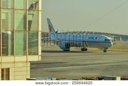 Passenger Airplane Docking At The Airport