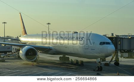 Passenger Airplane Docking At The Airport