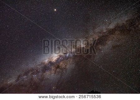 Milky Way In Clear Night Sky. Milky Way Is The Galaxy That Contains Our Solar System. The Descriptor