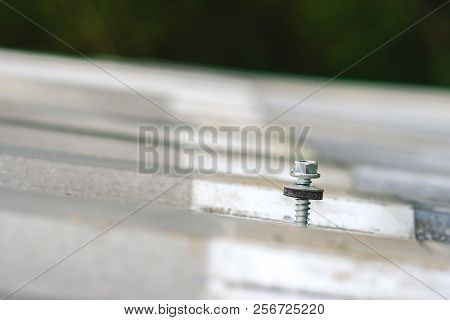 Gray Corrugated Metal Cladding On Industrial Building Roof