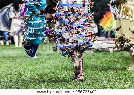 MASHANTUCKET RESERVATION, CT, USA-AUGUST 25, 2018: Dancers detail from Schemitzun 2018The 27th Annual Feast of Green Corn and Dance Powwow