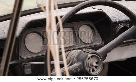 Wheel Car Of Mid-20th Century. Shot. Interior Of Old Car With Radio And Control Keys. Interior Insid