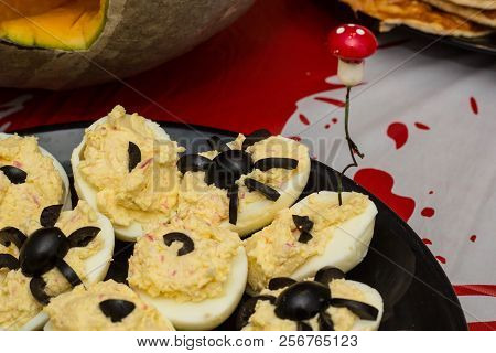 Deviled Eggs With A Spider For Halloween Party