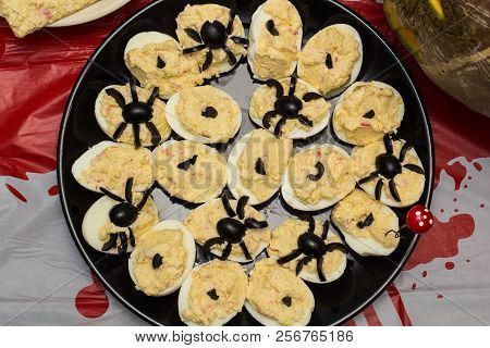 Deviled Eggs With A Spider For Halloween Party