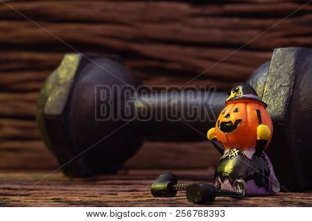 Halloween Festival Close Up Of Head Doll Pumpkins Haunted Spooky And The Black Iron Dumbbell. Fitnes