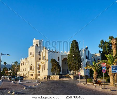 Kos, Greece - July 3, 2018. Principal Facade Of The Government Palace In The Greek Island Of Kos. Vi