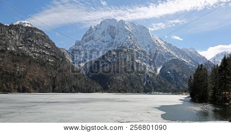 Frozen Little Alpine Lake In Northern Italy Near Tarvisio Town
