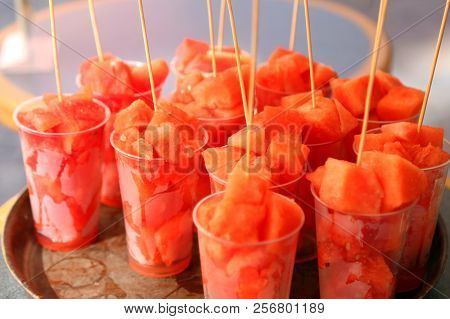 Red Pieces Of Ripe Watermelon In Glasses On Sale At The Bar