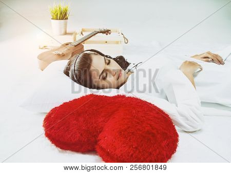 The Abstract Artdesign Background Of Sleeping Lady,beside Red Heart Pillow,vintage And Art Tone,blur