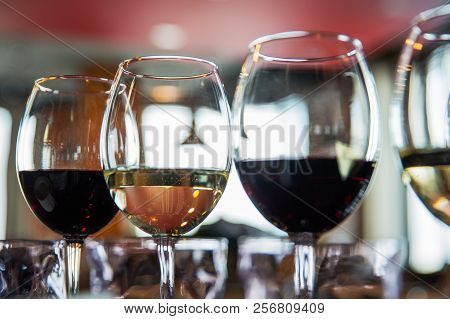 Glasses With Alcoholic Drinks In A Restaurant