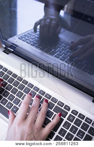 Woman Typing On Laptop Pc