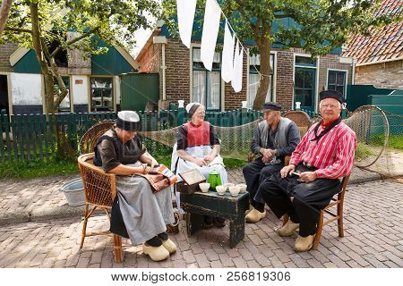 Enkhuizen, Netherlands - August 19, 2015 - The Inhabitants In The Traditional Clothes In Dutch Fishe