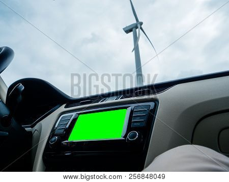 View From The Car Of Large Infotainment Gps Dashboard System And Large Wind Power Station - Netherla