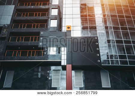 Mock-up Of Empty Urban Informational Waypoint Markers Pointing To The Left And Right Made Of A Black