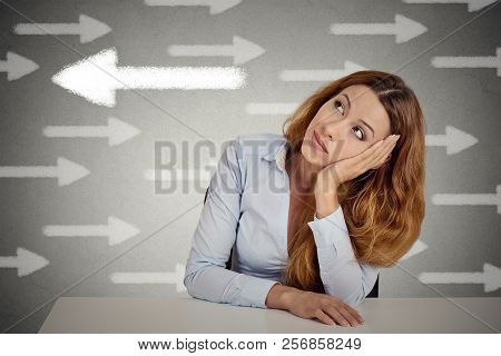 Thoughtful Woman Taking A Chance Going Against Flow. Thoughtful Businesswoman Sitting At Table Isola