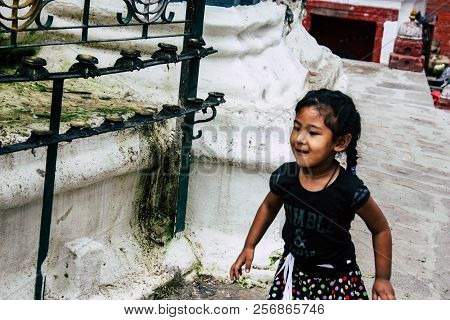 Kathmandu Nepal August 24, 2018 View Of A Nepali Child Playing Around The Shree Gha Stupa Temple Loc