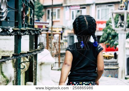 Kathmandu Nepal August 24, 2018 View Of A Nepali Child Playing Around The Shree Gha Stupa Temple Loc