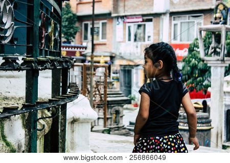 Kathmandu Nepal August 24, 2018 View Of A Nepali Child Playing Around The Shree Gha Stupa Temple Loc