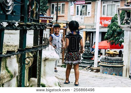 Kathmandu Nepal August 24, 2018 View Of A Nepali Child Playing Around The Shree Gha Stupa Temple Loc
