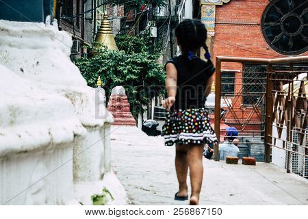 Kathmandu Nepal August 24, 2018 View Of A Nepali Child Playing Around The Shree Gha Stupa Temple Loc