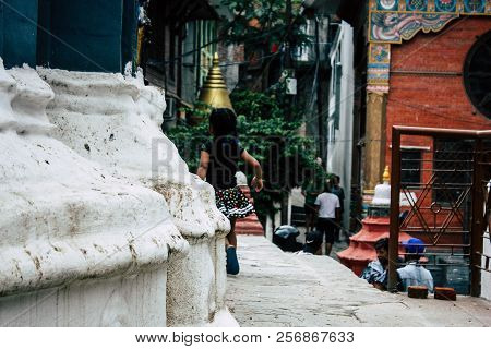 Kathmandu Nepal August 24, 2018 View Of A Nepali Child Playing Around The Shree Gha Stupa Temple Loc