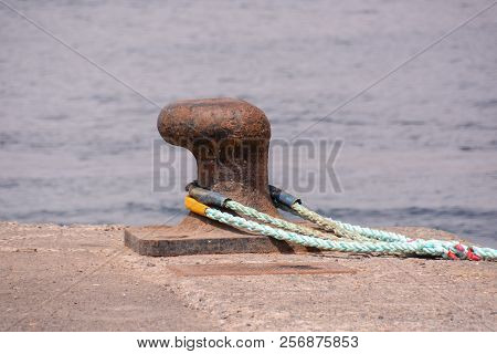 Photo Picture Of A Rusty Metal Mooring Bolard For Big Ship