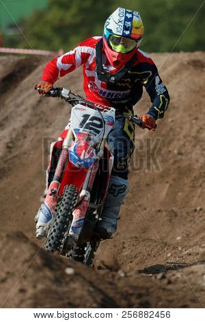 ST. PETERSBURG, RUSSIA - SEPTEMBER 2, 2018: Athletes compete in third stage of Russian Supercross Championship. This stage is held on the motor racing track of DOSAAF in Saint Petersburg