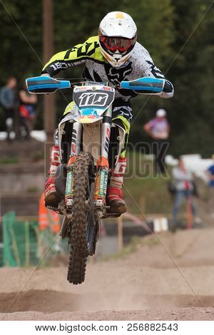 ST. PETERSBURG, RUSSIA - SEPTEMBER 2, 2018: Athletes compete in third stage of Russian Supercross Championship. This stage is held on the motor racing track of DOSAAF in Saint Petersburg