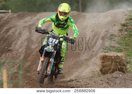 ST. PETERSBURG, RUSSIA - SEPTEMBER 2, 2018: Athletes compete in third stage of Russian Supercross Championship. This stage is held on the motor racing track of DOSAAF in Saint Petersburg
