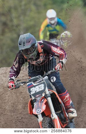 ST. PETERSBURG, RUSSIA - SEPTEMBER 2, 2018: Athletes compete in third stage of Russian Supercross Championship. This stage is held on the motor racing track of DOSAAF in Saint Petersburg