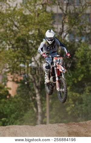 ST. PETERSBURG, RUSSIA - SEPTEMBER 2, 2018: Athletes compete in third stage of Russian Supercross Championship. This stage is held on the motor racing track of DOSAAF in Saint Petersburg