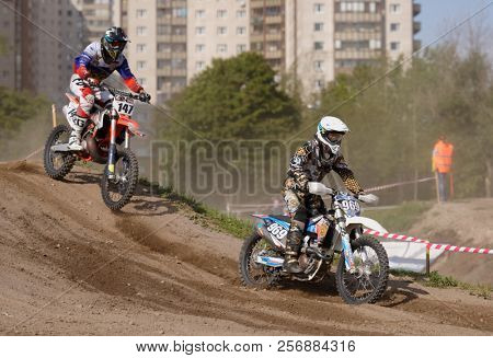 ST. PETERSBURG, RUSSIA - SEPTEMBER 2, 2018: Athletes compete in third stage of Russian Supercross Championship. This stage is held on the motor racing track of DOSAAF in Saint Petersburg