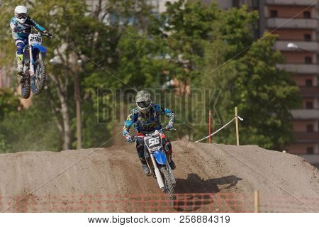 ST. PETERSBURG, RUSSIA - SEPTEMBER 2, 2018: Athletes compete in third stage of Russian Supercross Championship. This stage is held on the motor racing track of DOSAAF in Saint Petersburg
